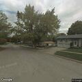 Person experiencing abdominal pain at Harvard Drive