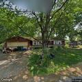 People living in camper behind Circle Drive home