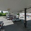 Couple arguing at gas station, property damaged