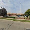 Person sleeping outside Walgreens in Janesville