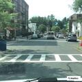 Speeding red pickup repeatedly on Spring Street