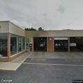 Vehicle fire near building on Wolf Road