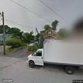 Officer stands by box truck during parking issue