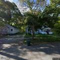 Basement window damage reported at house