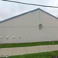 Man behaving oddly on sidewalk at Lansing rescue mission