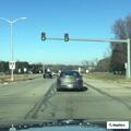 Blue car stalled in traffic at Highway 36 and D