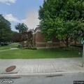 Car hits sign and lawn at Warsaw Public Library
