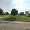 Officers check on dogs in shed behind home