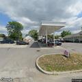 Man pinned between truck and post at gas station