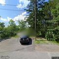 Car and motorcycle crash with leg injury