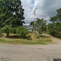 Unresponsive male breathing on Purcell Road