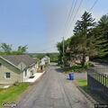 Report of protected person hiding behind house