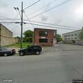 Woman having difficulty breathing near State Street