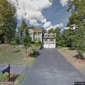 Fire crew checks carbon monoxide alarm at home