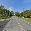 Traffic stop on red Chevy Cruze near Long Lake Rd