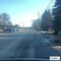 Car runs off road near Milford High School
