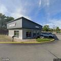 Hit-and-run damages pole at Verizon store lot