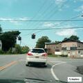 Truck towing trailer without tail lights on Route 63