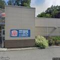 Officer checks parked Honda at Burger King