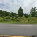 82-year-old woman experiencing back pain at New Woodstock