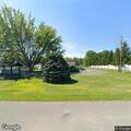 Suspicious men using tools around home in trailer park