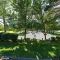 Person in car shining laser at caller in park