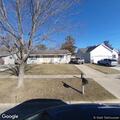 Person having a panic attack and breathing difficulty at home