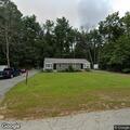 Dog trapped in vent under mobile home