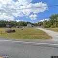 Officer stops black Nissan Rogue at motel