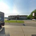 Tenant yelling near roadway outside Travelers Inn