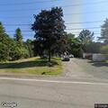 Officer serving restraining order at residence