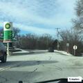 Officer assisting citizen at Citgo gas station