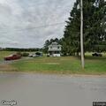 Telephone poles blocking roadway near Bethany address