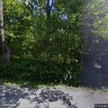 Person with flashlight reported in driveway