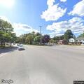 Person found lying half under tree at Alden intersection