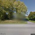 Neighbor dispute over grass and tree trimming