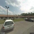 Ambulance on standby at mental health building parking lot