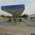 Employee blocks entrance at gas station