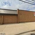 Woman's arm freed from bread sheeter at Riverside Market