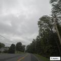 Woman walking barefoot near Country Store on State Route 67