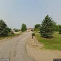 Tree limb causes arcing power line at house