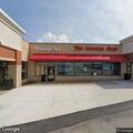 Officers check open door at laundry shop