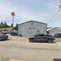 Suspicious man loitering outside auto center