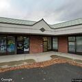 Officer checks man behind Keene Library