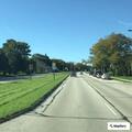 Large road hole with limited barricades reported