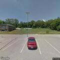 Officer stops white Toyota at Fulton business