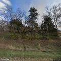 Controlled burn spreads to structure on Dipper Avenue