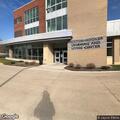 Person experiencing abdominal pain at college living center
