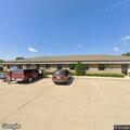 Female in 80s unconscious but breathing at dialysis center