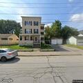Person with abdominal pain in Manchester apartment